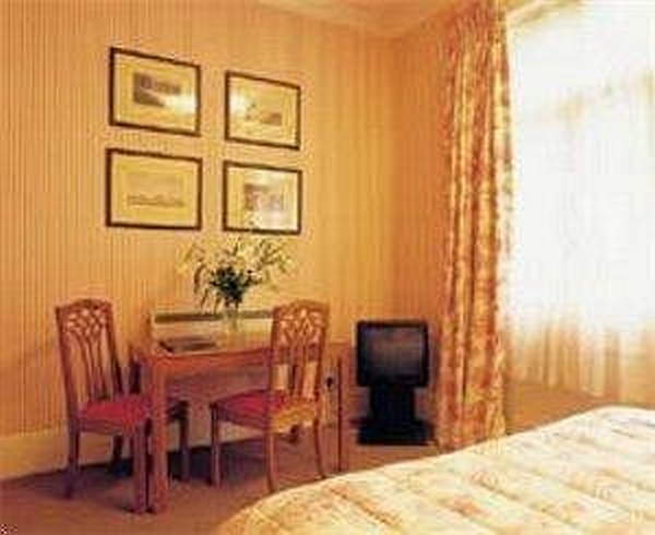 Astons Apartments Лондон Стая снимка