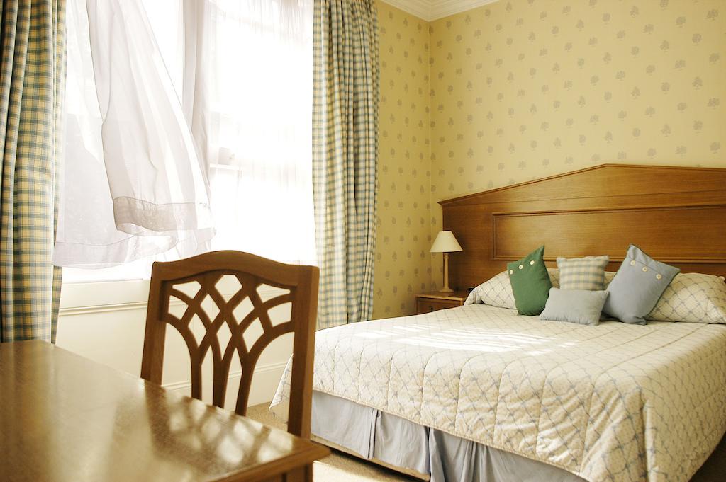 Astons Apartments Лондон Стая снимка