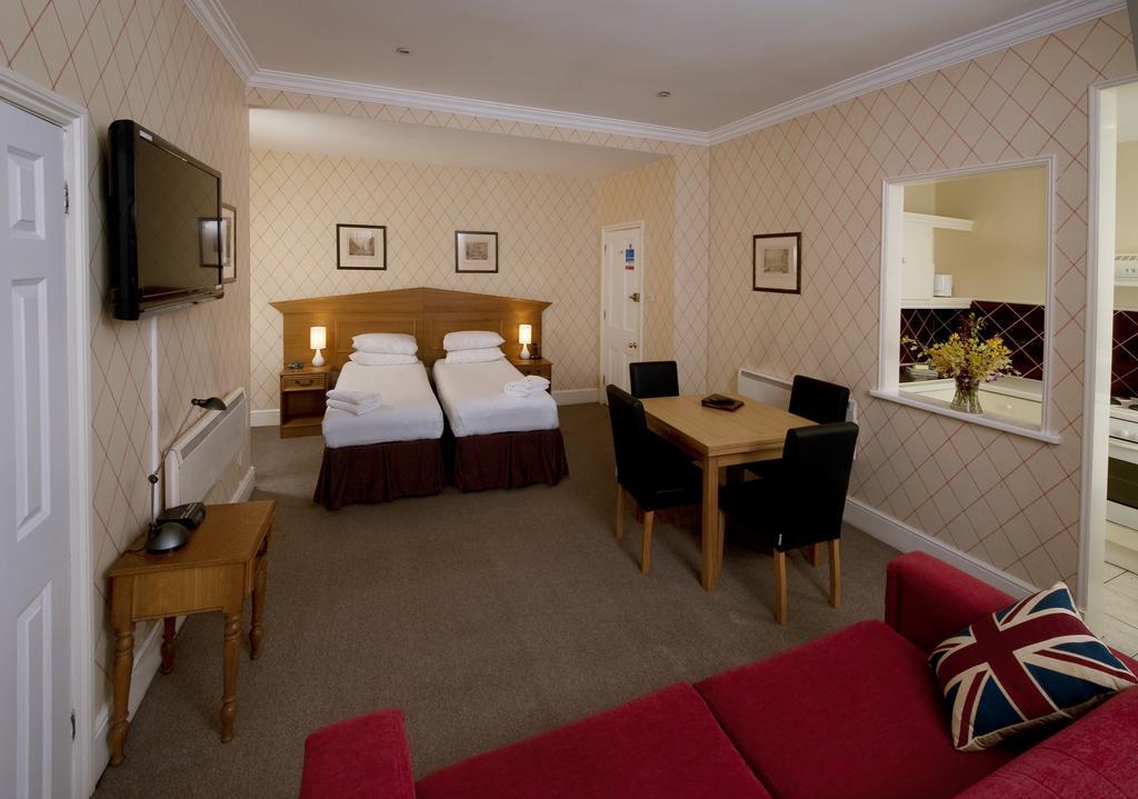Astons Apartments Лондон Стая снимка